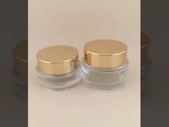 Durchsichtige Glascreme-Glasflasche mit goldenem Schraubdeckel für weibliche Lotion
