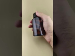 Zartes Design, klare, braune, glatte, runde Glasflasche mit speziellem Deckel für Medikamente