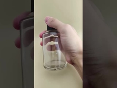 Fein gestaltete klare große glatte runde Glasflasche mit speziellem Deckel für Medikamente