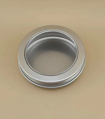 Großer silberner Aluminiumkoffer mit klarer Schraubkappe für Kosmetika