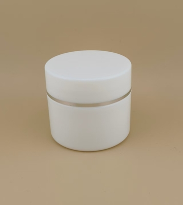 Weißer Kunststoff-Cremetiegel mit silbernem Rand für Damen-Lotion