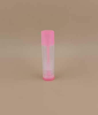 Kleine, glatte, transparente Lippenbalsam-Verpackung mit rosa Deckel für Lippenstifte