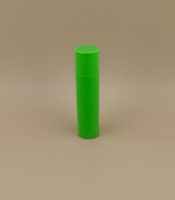 Kleine, glatte, grüne Lippenbalsam-Verpackung mit rosa Deckel für Lippenstifte