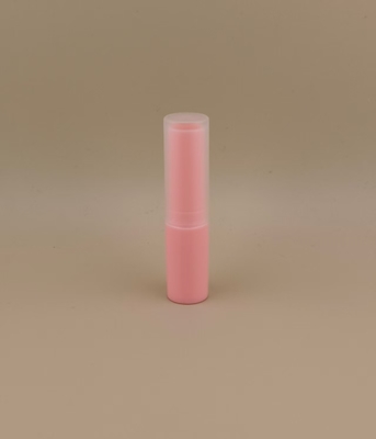 Rosa kleine Lippenbalsam-Verpackung mit durchsichtigem, geripptem Deckel für Lippenstifte