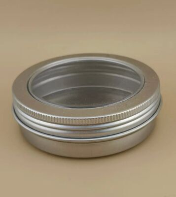 Großer silberner Aluminiumkoffer mit klarer Schraubkappe für Kosmetika